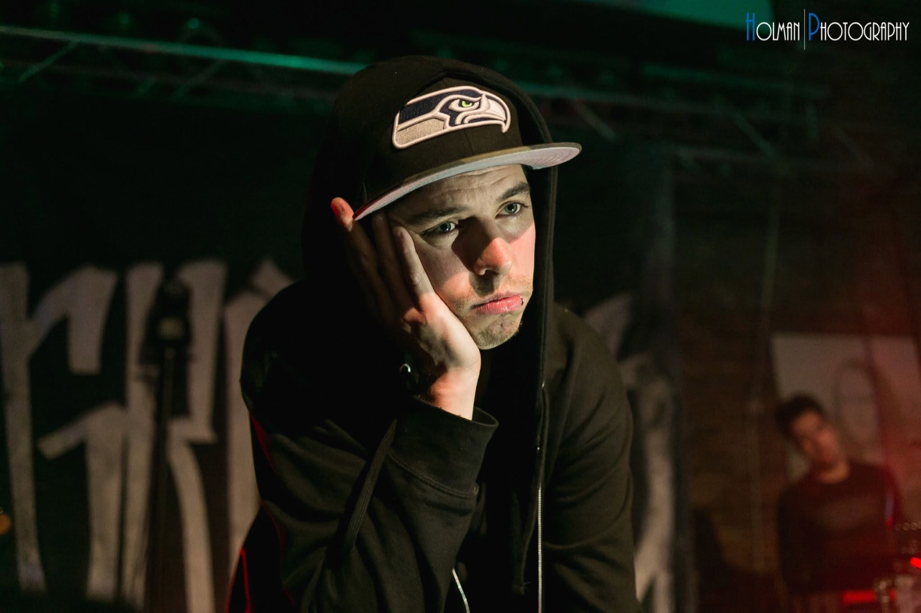 Portrait of Grieves in green light